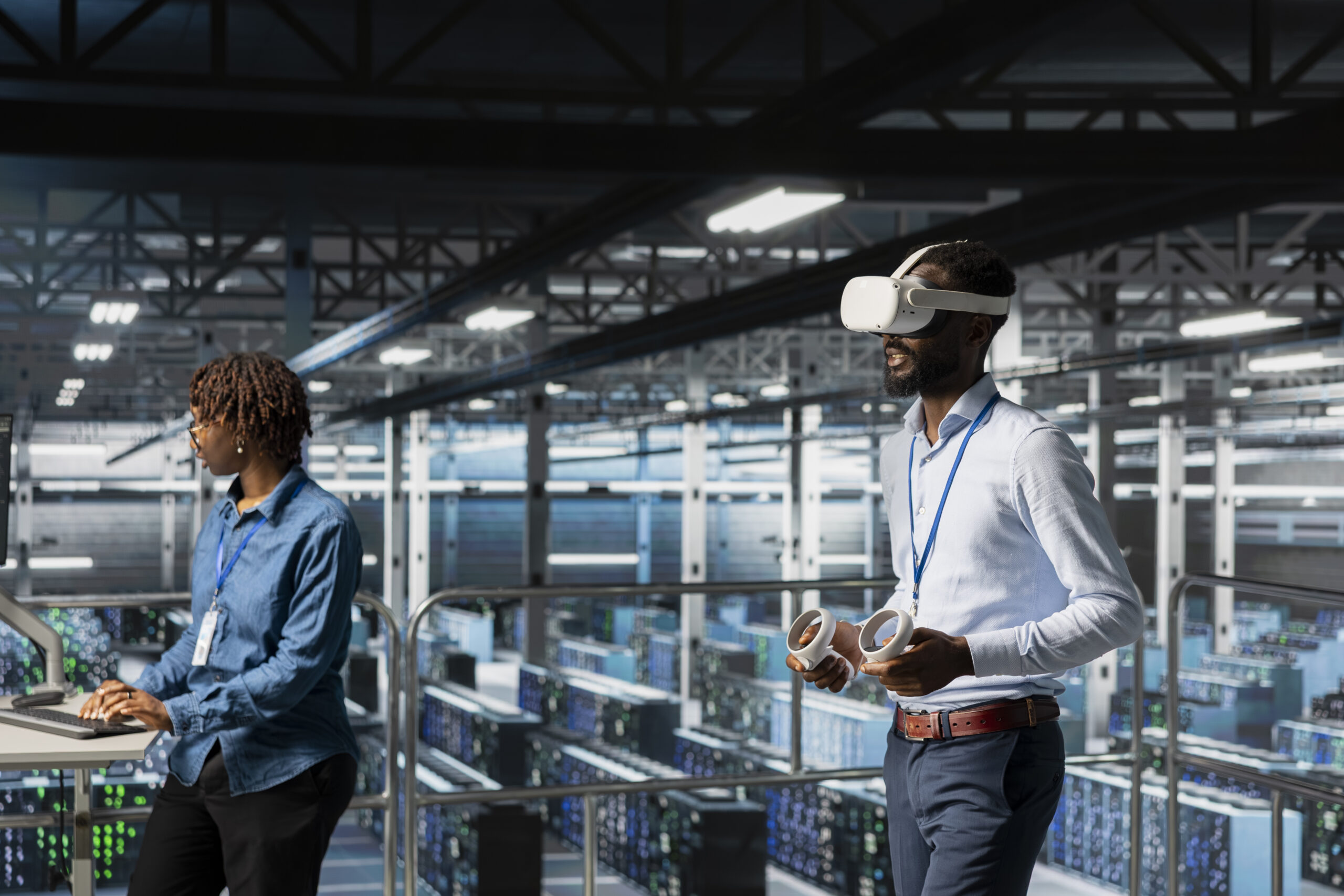 Engineer using a virtual reality headset while working on data center servers