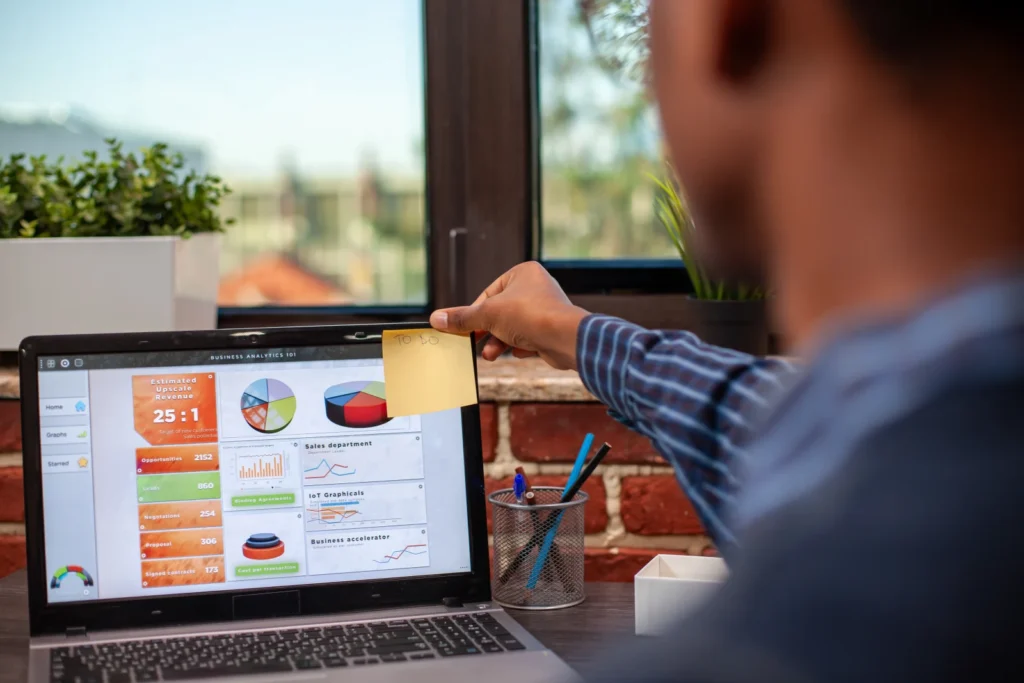 Office worker setting project reminders