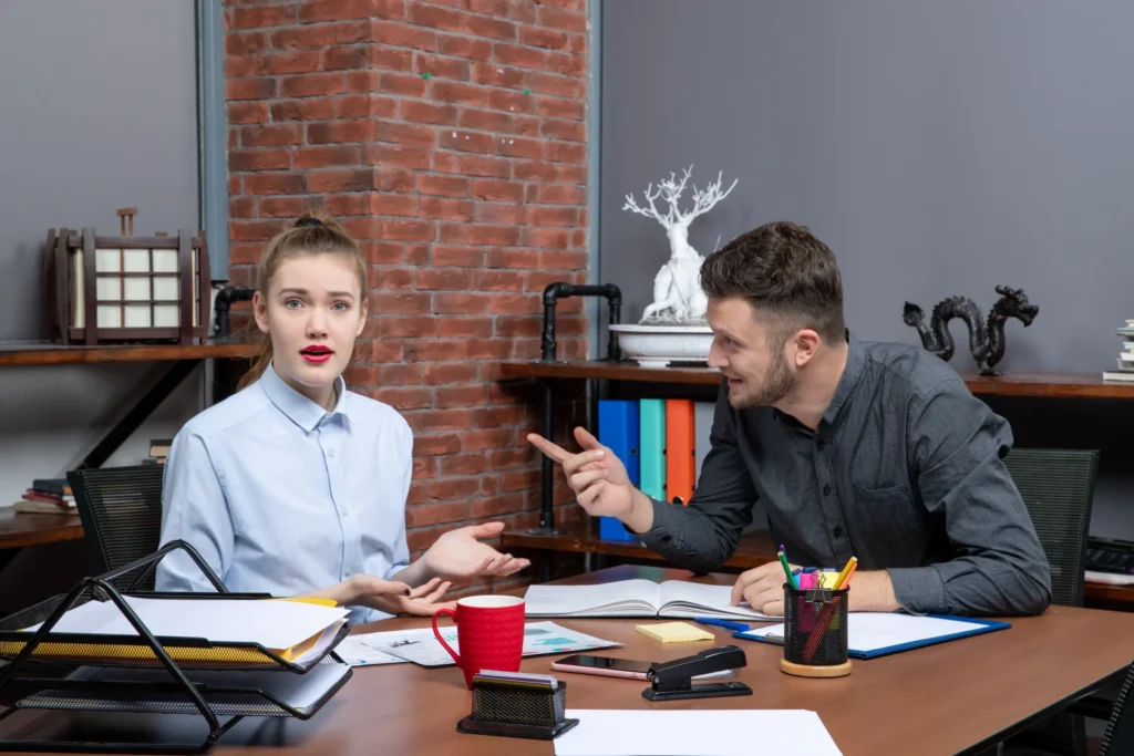 Top view young busy office team sitting table discussing one important issue office
