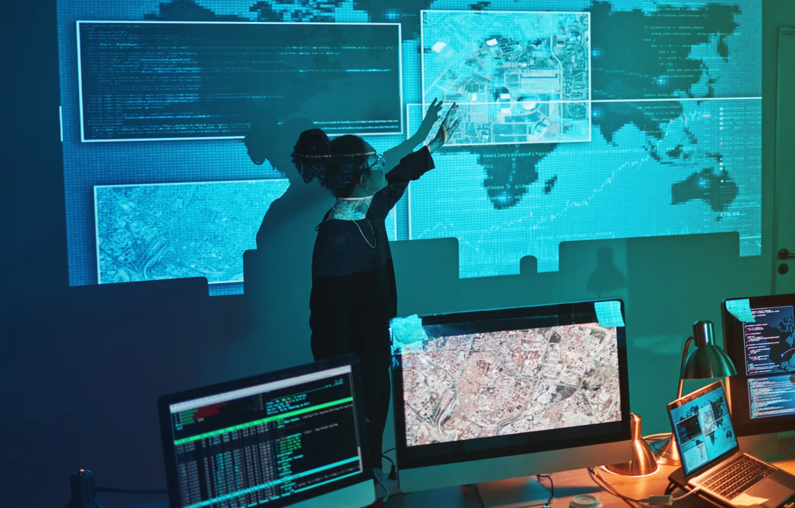 Cybersecurity woman global network presentation phishing ransomware cyber search maps digital database it worker dark room virtual malware hacking fix programmer