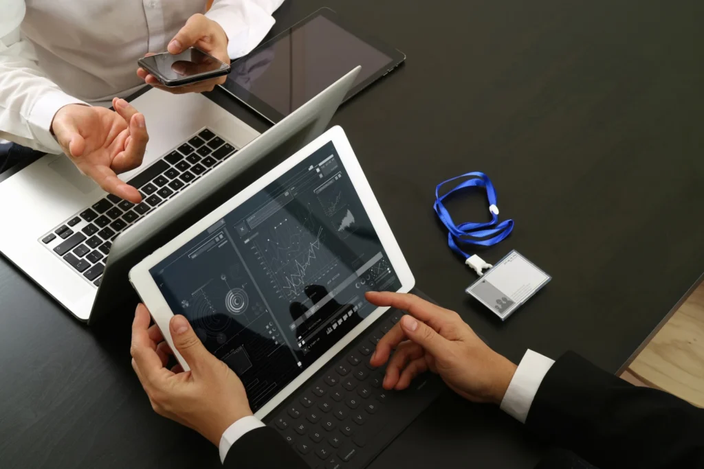 Businessman using smartphone digital tablet